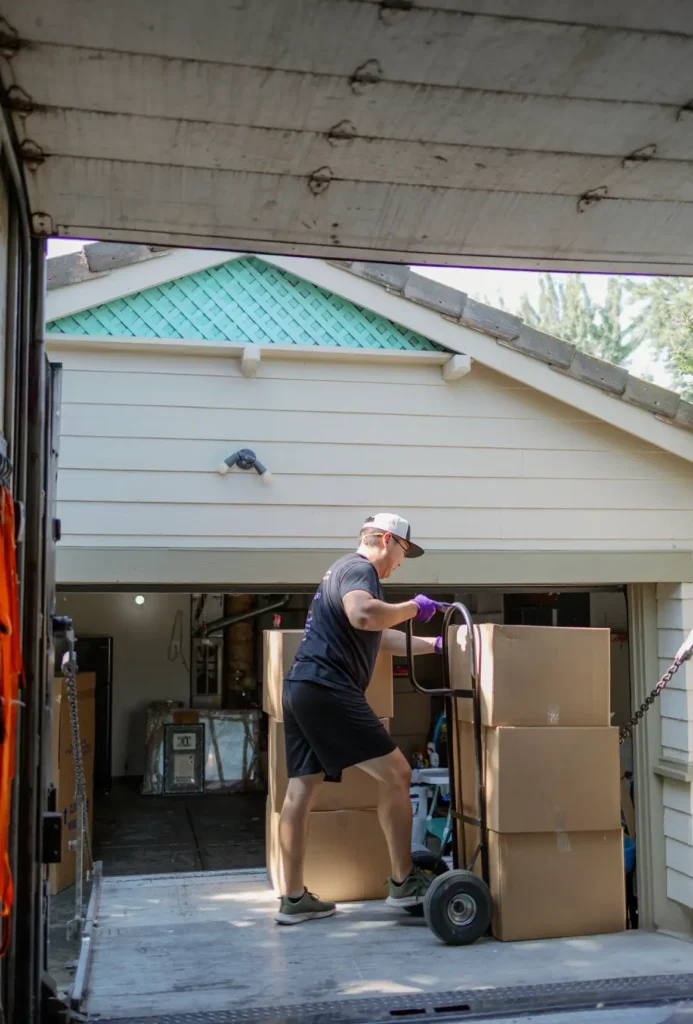 Local movers in Sacramento from Service Pro Movers unloading a truck, demonstrating how to find local movers for efficient relocations