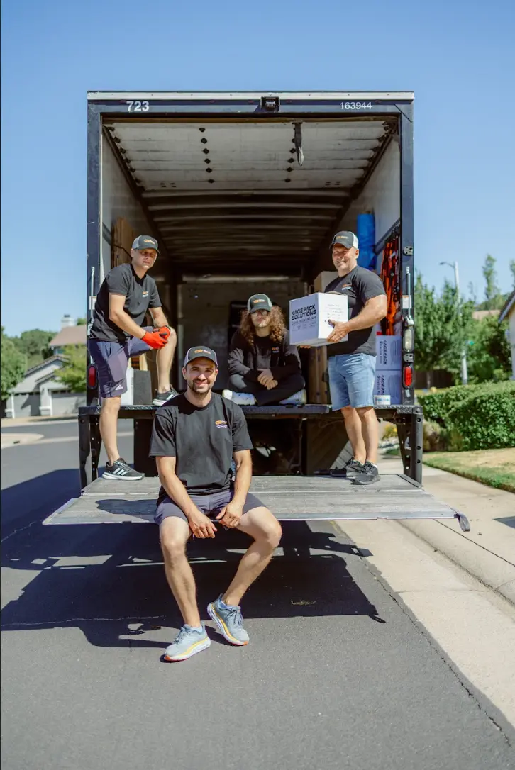 Moving help in Sacramento – professional movers assisting with heavy furniture
