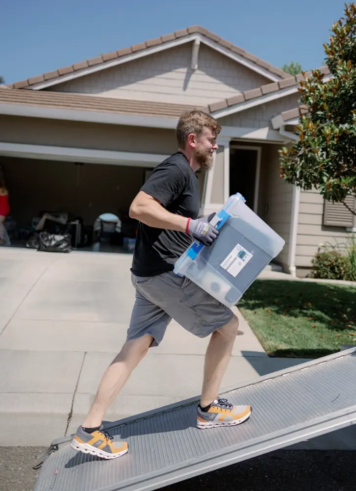 Full service office movers packing desks and computers in Sacramento office