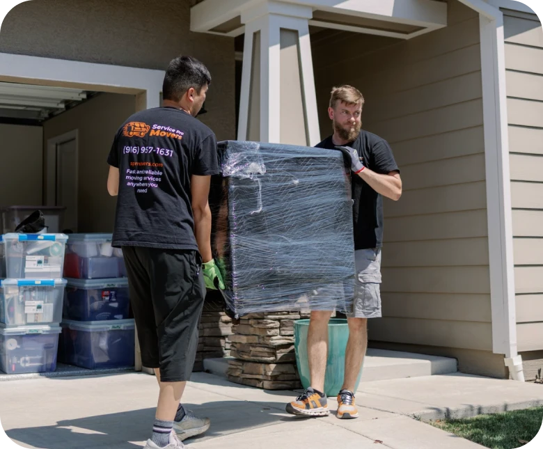Movers carrying boxes